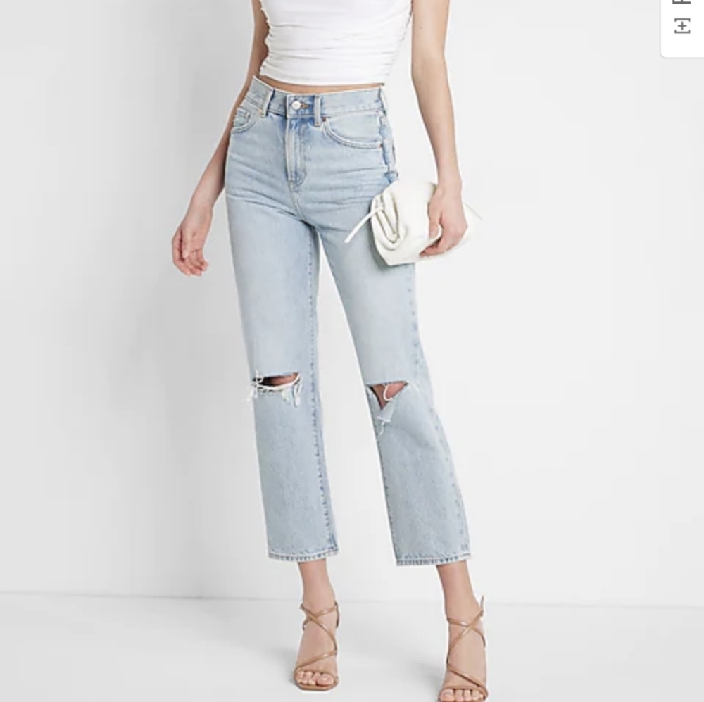 High waisted light wash distressed ankle jeans